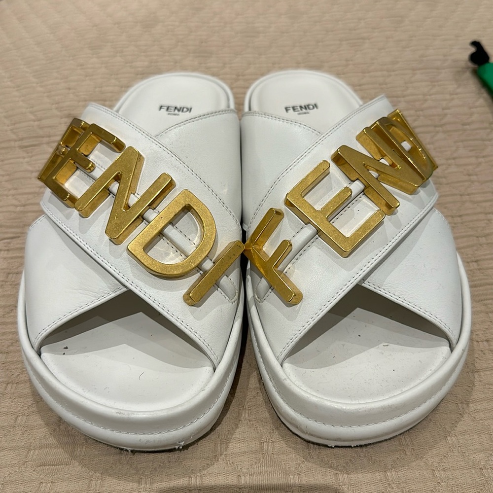 White Fendi slides